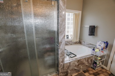 Welcome home to 116 Eastlake Landing, nestled in the highly on Summergrove Golf Club in Georgia - for sale on GolfHomes.com, golf home, golf lot