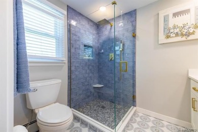 Welcome to this stunning, elegantly updated colonial nestled in on Hilltop Golf Course in Michigan - for sale on GolfHomes.com, golf home, golf lot