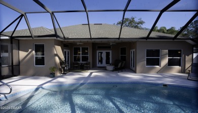 Impeccably maintained salt water pool home in golf course on The Grand Club Cypress Course in Florida - for sale on GolfHomes.com, golf home, golf lot