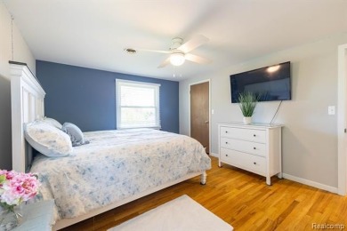 Welcome to this stunning, elegantly updated colonial nestled in on Hilltop Golf Course in Michigan - for sale on GolfHomes.com, golf home, golf lot