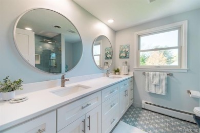 Welcome to this stunning, elegantly updated colonial nestled in on Hilltop Golf Course in Michigan - for sale on GolfHomes.com, golf home, golf lot