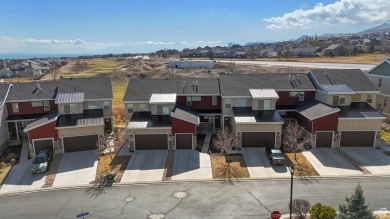 This stunning townhome, nestled against the picturesque Talons on Talons Cove Golf Club in Utah - for sale on GolfHomes.com, golf home, golf lot