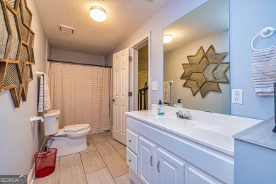 This Beautiful 5 bedroom 3.5 bath home in desirable Windalier on Canongate At Flat Creek Club in Georgia - for sale on GolfHomes.com, golf home, golf lot