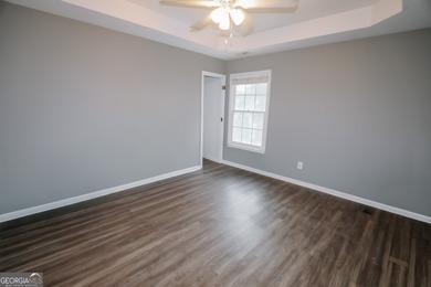 Welcome home to 116 Eastlake Landing, nestled in the highly on Summergrove Golf Club in Georgia - for sale on GolfHomes.com, golf home, golf lot