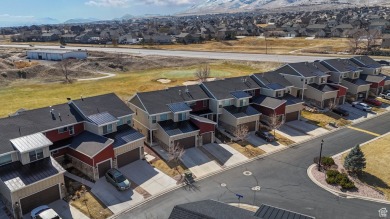 This stunning townhome, nestled against the picturesque Talons on Talons Cove Golf Club in Utah - for sale on GolfHomes.com, golf home, golf lot