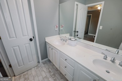 Welcome home to 116 Eastlake Landing, nestled in the highly on Summergrove Golf Club in Georgia - for sale on GolfHomes.com, golf home, golf lot