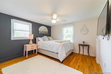 Welcome to this stunning, elegantly updated colonial nestled in on Hilltop Golf Course in Michigan - for sale on GolfHomes.com, golf home, golf lot