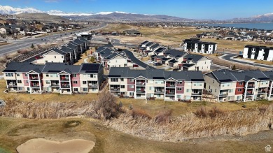 This stunning townhome, nestled against the picturesque Talons on Talons Cove Golf Club in Utah - for sale on GolfHomes.com, golf home, golf lot