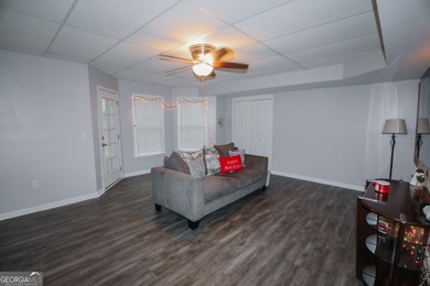 Welcome home to 116 Eastlake Landing, nestled in the highly on Summergrove Golf Club in Georgia - for sale on GolfHomes.com, golf home, golf lot