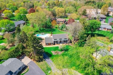Welcome to this stunning, elegantly updated colonial nestled in on Hilltop Golf Course in Michigan - for sale on GolfHomes.com, golf home, golf lot