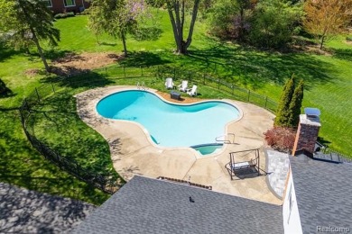 Welcome to this stunning, elegantly updated colonial nestled in on Hilltop Golf Course in Michigan - for sale on GolfHomes.com, golf home, golf lot
