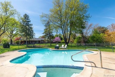 Welcome to this stunning, elegantly updated colonial nestled in on Hilltop Golf Course in Michigan - for sale on GolfHomes.com, golf home, golf lot