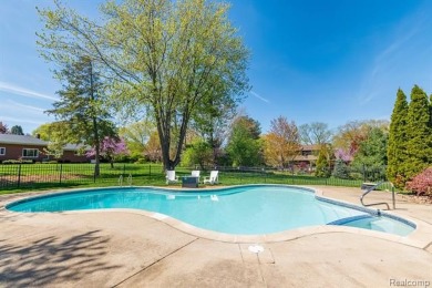 Welcome to this stunning, elegantly updated colonial nestled in on Hilltop Golf Course in Michigan - for sale on GolfHomes.com, golf home, golf lot