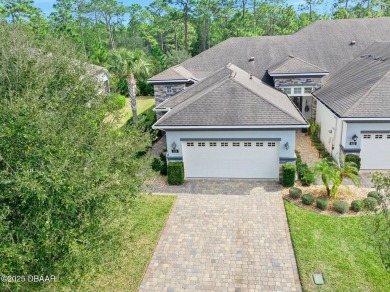 Maintenance-Free Living in Plantation Bay! This beautifully on Plantation Bay Golf and Country Club in Florida - for sale on GolfHomes.com, golf home, golf lot
