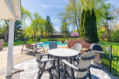 Welcome to this stunning, elegantly updated colonial nestled in on Hilltop Golf Course in Michigan - for sale on GolfHomes.com, golf home, golf lot