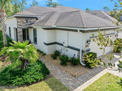 Maintenance-Free Living in Plantation Bay! This beautifully on Plantation Bay Golf and Country Club in Florida - for sale on GolfHomes.com, golf home, golf lot