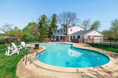 Welcome to this stunning, elegantly updated colonial nestled in on Hilltop Golf Course in Michigan - for sale on GolfHomes.com, golf home, golf lot