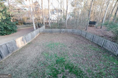 Welcome home to 116 Eastlake Landing, nestled in the highly on Summergrove Golf Club in Georgia - for sale on GolfHomes.com, golf home, golf lot