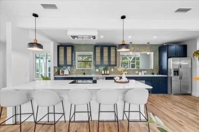 Live the resort lifestyle in this stunning, high-end renovated on The Renaisssance Vinoy Golf Club in Florida - for sale on GolfHomes.com, golf home, golf lot