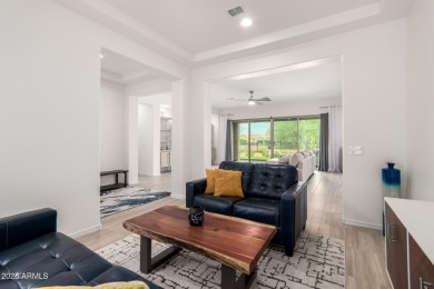 AMAZING RESORT LIVING w/ OPEN WASH VIEWS! Enter this beautifully on Poston Butte Golf Club in Arizona - for sale on GolfHomes.com, golf home, golf lot