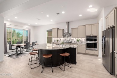 AMAZING RESORT LIVING w/ OPEN WASH VIEWS! Enter this beautifully on Poston Butte Golf Club in Arizona - for sale on GolfHomes.com, golf home, golf lot