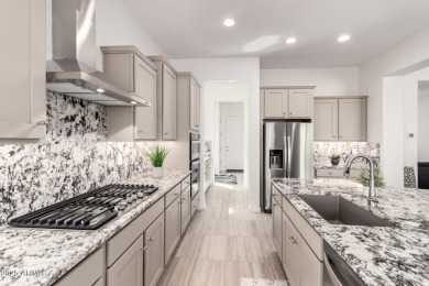 AMAZING RESORT LIVING w/ OPEN WASH VIEWS! Enter this beautifully on Poston Butte Golf Club in Arizona - for sale on GolfHomes.com, golf home, golf lot