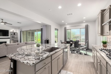AMAZING RESORT LIVING w/ OPEN WASH VIEWS! Enter this beautifully on Poston Butte Golf Club in Arizona - for sale on GolfHomes.com, golf home, golf lot