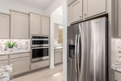 AMAZING RESORT LIVING w/ OPEN WASH VIEWS! Enter this beautifully on Poston Butte Golf Club in Arizona - for sale on GolfHomes.com, golf home, golf lot