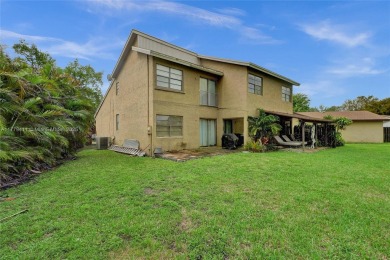 Charming 4-bedroom, 3-bathroom home in the desirable West on Calusa Country Club in Florida - for sale on GolfHomes.com, golf home, golf lot