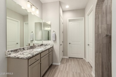 AMAZING RESORT LIVING w/ OPEN WASH VIEWS! Enter this beautifully on Poston Butte Golf Club in Arizona - for sale on GolfHomes.com, golf home, golf lot