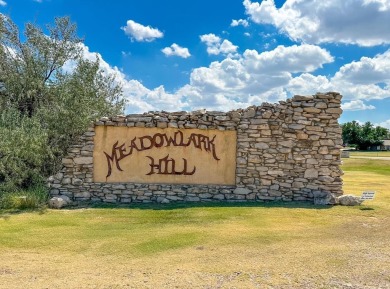 Nestled on a large corner lot in the quaint Meadowlark Hill on Borger Country Club in Texas - for sale on GolfHomes.com, golf home, golf lot