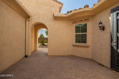 AMAZING RESORT LIVING w/ OPEN WASH VIEWS! Enter this beautifully on Poston Butte Golf Club in Arizona - for sale on GolfHomes.com, golf home, golf lot