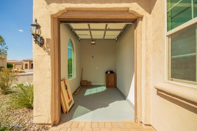 AMAZING RESORT LIVING w/ OPEN WASH VIEWS! Enter this beautifully on Poston Butte Golf Club in Arizona - for sale on GolfHomes.com, golf home, golf lot