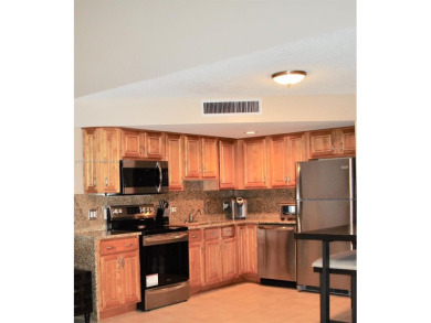 Beautiful one bedroom condo in the Racquet club at Deer Creek on Deer Creek Golf Club in Florida - for sale on GolfHomes.com, golf home, golf lot