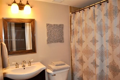 Beautiful one bedroom condo in the Racquet club at Deer Creek on Deer Creek Golf Club in Florida - for sale on GolfHomes.com, golf home, golf lot