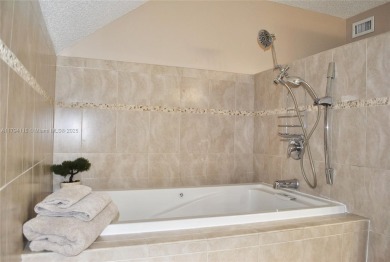 Beautiful one bedroom condo in the Racquet club at Deer Creek on Deer Creek Golf Club in Florida - for sale on GolfHomes.com, golf home, golf lot