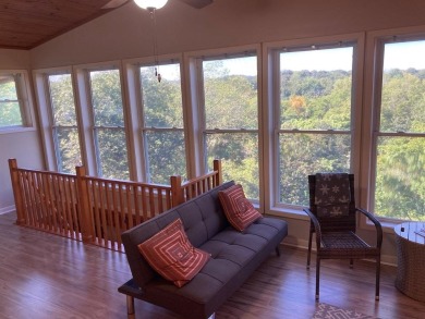 ABSOLUTELY STUNNING! MOVE-IN READY with STORAGE GALORE! on Cherokee Village North Course in Arkansas - for sale on GolfHomes.com, golf home, golf lot