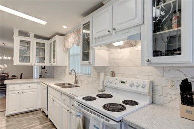 Beautifully maintained home built in 2002, offering over 1,500 on Barefoot Bay Golf Course in Florida - for sale on GolfHomes.com, golf home, golf lot