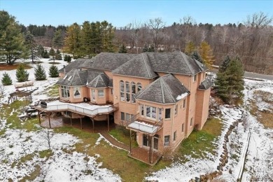 Discover unparalleled luxury and craftsmanship in this stunning on Bruce Hills Golf Course in Michigan - for sale on GolfHomes.com, golf home, golf lot