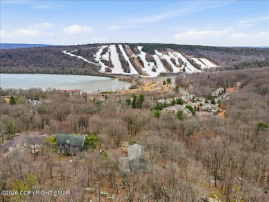 Perched on a private ridge in the sought-after Lake Harmony on Split Rock Resort and Country Club in Pennsylvania - for sale on GolfHomes.com, golf home, golf lot
