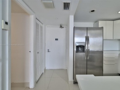 Step inside with me. Newly remodeled luxury condo in Aventura on Turnberry Isle Resort and Club in Florida - for sale on GolfHomes.com, golf home, golf lot