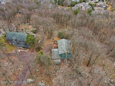 Perched on a private ridge in the sought-after Lake Harmony on Split Rock Resort and Country Club in Pennsylvania - for sale on GolfHomes.com, golf home, golf lot