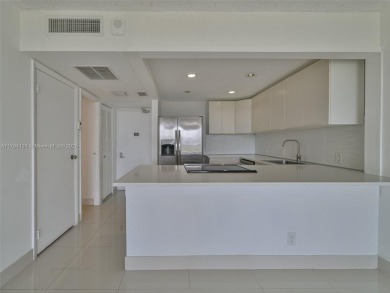 Step inside with me. Newly remodeled luxury condo in Aventura on Turnberry Isle Resort and Club in Florida - for sale on GolfHomes.com, golf home, golf lot
