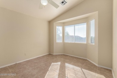 Welcome to this charming home in Qual Crossing at Dove Mountain! on Heritage Highlands At Dove Mountain in Arizona - for sale on GolfHomes.com, golf home, golf lot