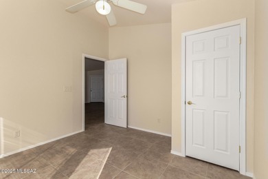 Welcome to this charming home in Qual Crossing at Dove Mountain! on Heritage Highlands At Dove Mountain in Arizona - for sale on GolfHomes.com, golf home, golf lot