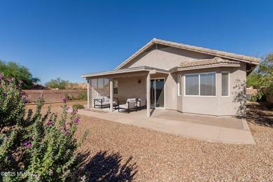 Welcome to this charming home in Qual Crossing at Dove Mountain! on Heritage Highlands At Dove Mountain in Arizona - for sale on GolfHomes.com, golf home, golf lot