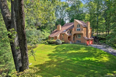 Nestled on nearly two acres of lush, tree-lined property, this on Hudson National Golf Club in New York - for sale on GolfHomes.com, golf home, golf lot