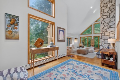 Nestled on nearly two acres of lush, tree-lined property, this on Hudson National Golf Club in New York - for sale on GolfHomes.com, golf home, golf lot