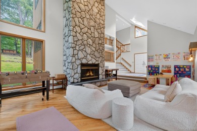 Nestled on nearly two acres of lush, tree-lined property, this on Hudson National Golf Club in New York - for sale on GolfHomes.com, golf home, golf lot