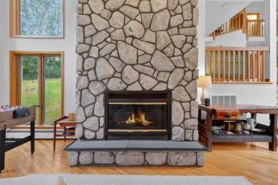 Nestled on nearly two acres of lush, tree-lined property, this on Hudson National Golf Club in New York - for sale on GolfHomes.com, golf home, golf lot